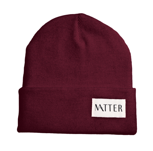 burgundy ribbed knit beanie with Matter label on folded brim