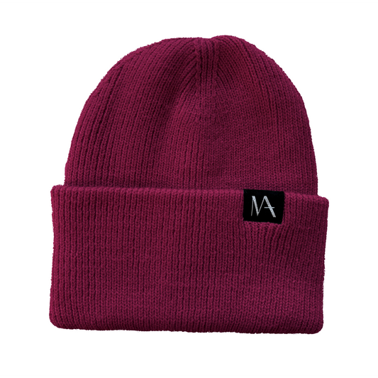 Burgundy ribbed knit beanie with turned-up brim and black WearMatter label