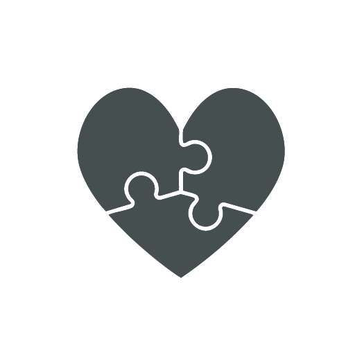 Heart made from interlocking puzzle pieces, conveying meaningful design and connection